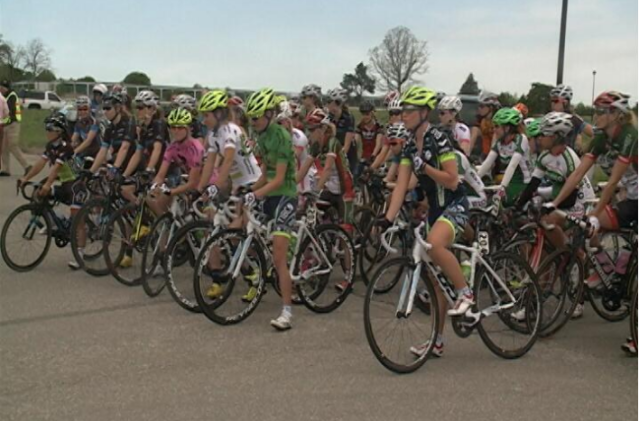 TIBCO in the pink, green and white jerseys on the start of stage 3